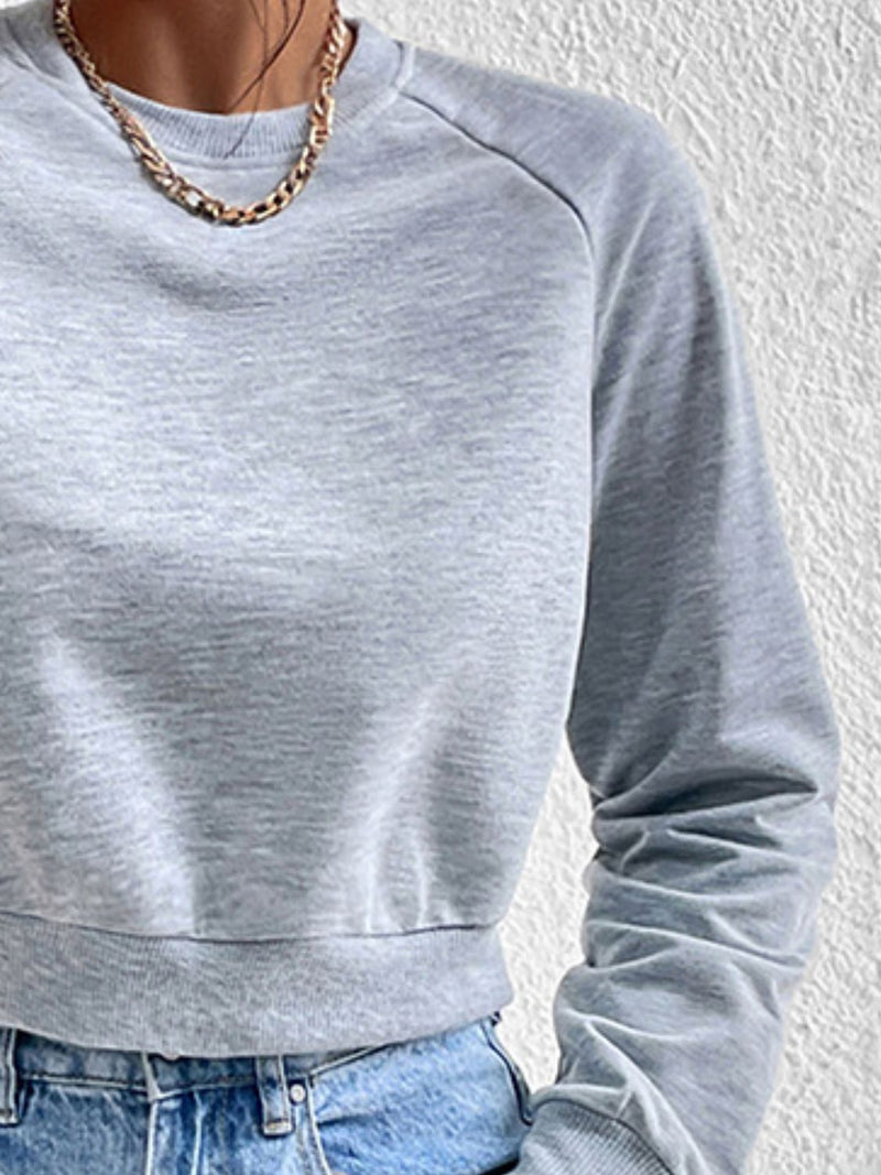 Perfee Raglan Sleeve Round Neck Cropped Sweatshirt